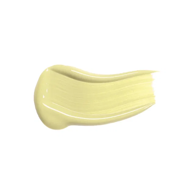 Мазок бежевого консилера на белом фоне