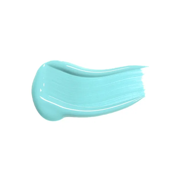 Мазок зелёного консилера на белом фоне